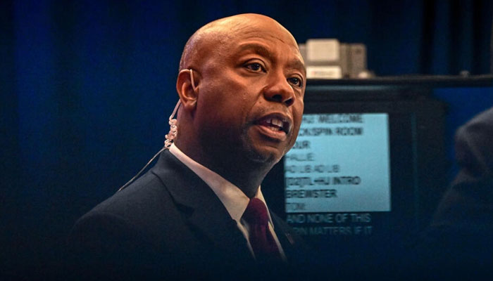 US Senator Tim Scott speaks to members of the media following the third Republican presidential primary debate on November 8, 2023. — AFP