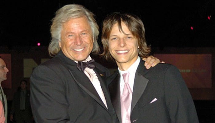 Peter Nygard with his son Kai Zen Bickle during a fashion show. — X/@grosbygroup