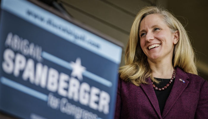 Abigail Spanberger gestures during a political gathering. — X/@samuelcorum