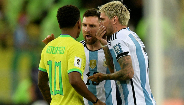 Argentina´s forward Lionel Messi (C) and midfielder Rodrigo De Paul (R) argue with Brazil´s forward Rodrygo during the 2026 FIFA World Cup South American qualification football match between Brazil and Argentina at Maracana Stadium in Rio de Janeiro, Brazil, on November 21, 2023. — AFP