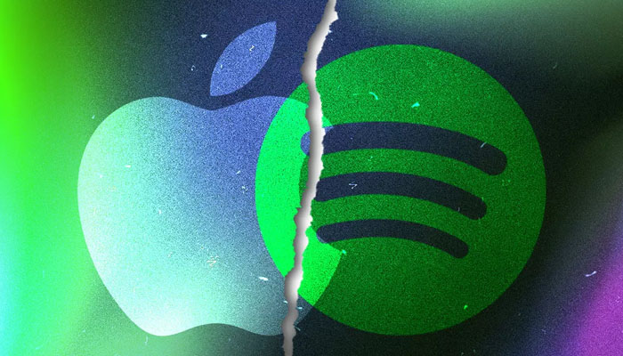 Apple Music and Spotify logos. — X/@adweek