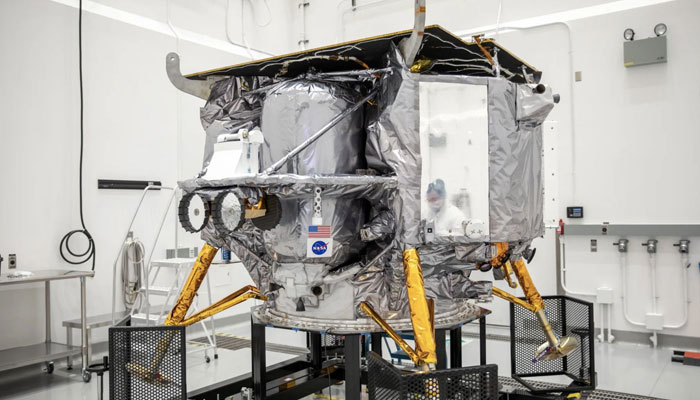 This picture shows scientists working inside Astrobotics Peregrine lander set to be launched on December 24, 2023. — X/@NASA
