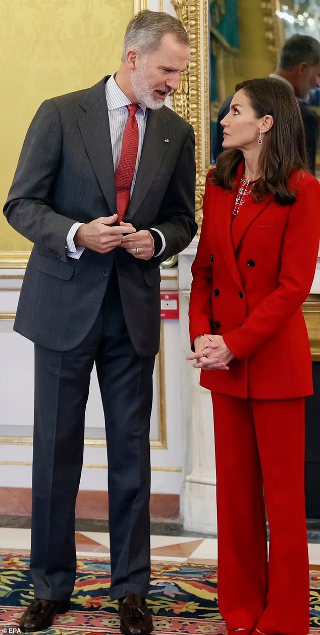 Queen Letizia of Spain brushes off affair allegations on outing with King Felipe
