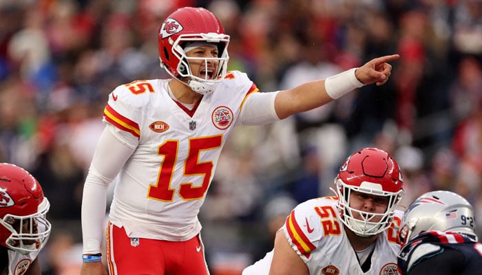 Patrick Mahomes #15 of the Kansas City Chiefs calls a play during the second half against the New England Patriots at Gillette Stadium on December 17, 2023, in Foxborough, Massachusetts.