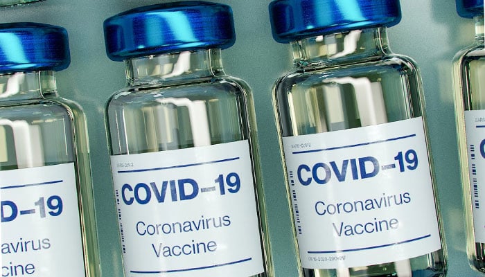 This representational picture shows plastic bottles of COVID-19 vaccine. — Unsplash