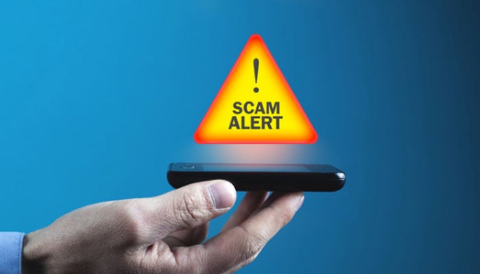 A representational image displaying Scam Alert. — Canva