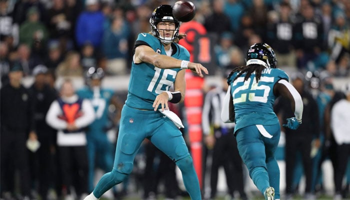 Trevor Lawrence #16 of the Jacksonville Jaguars throws a pass against the Baltimore Ravens during the third quarter at EverBank Stadium on December 17, 2023, in Jacksonville, Florida. — AFP