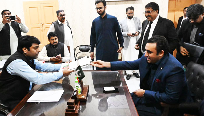 PPP Chairman Bilawal Bhutto-Zardari (right) submits his nomination papers for the February 8 general elections on December 24, 2023. — X/ @MediaCellPPP