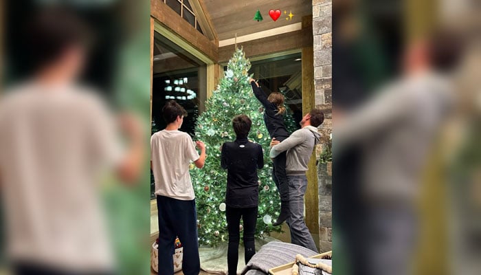 A screengrab of Tom Bradys Instagram Story with a photo showing the athlete helping his daughter Vivian decorate a Christmas tree, accompanied by his sons Jack (left) and Benjamin. — Instagram/@tombrady