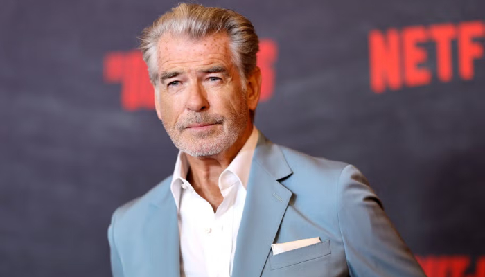 Pierce Brosnan cited by Yellowstone national park for stepping on thermal area