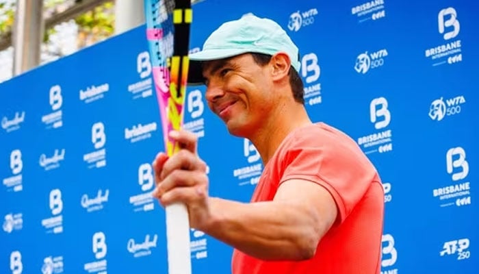 Spains Rafael Nadal waves to fans during a promotional event ahead of the Brisbane International tennis tournament. — AFP