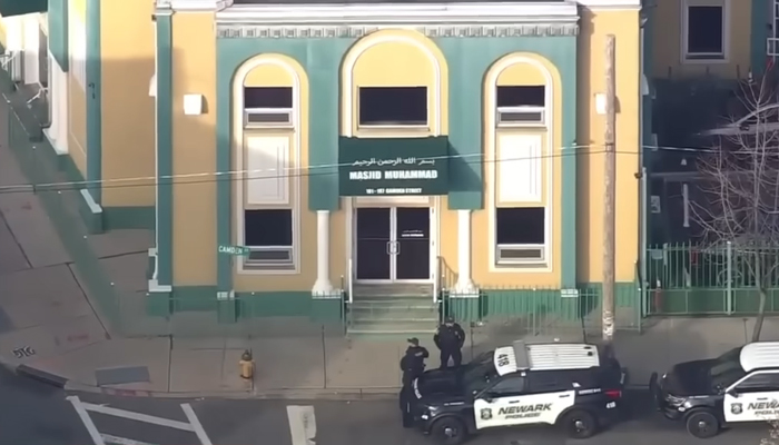 This still shows New Jersey police officials standing outside the Masjid Muhammad-Newark, New Jersey on January 3, 2023. — YouTube/LiveNOW from FOX