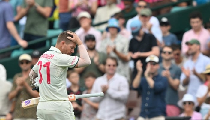 Australia´s David Warner walks off the field after his dismissal during the second day of the third cricket Test match against Pakistan at the Sydney Cricket Ground in Sydney on January 4, 2024. —AFP