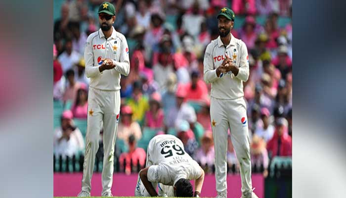 Pakistans Aamer Jamal (C) celebrates his fifth wicket in the first innings during day three of the third cricket Test match between Australia and Pakistan at the Sydney Cricket Ground in Sydney on January 5, 2024. — AFP