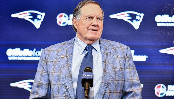 Bill Belichick gestures during a gathering. — AFP/File