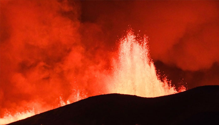 Iceland Volcano: Flowing lava is seen during at a fissure on the Reykjanes peninsula 3km north of Grindavik, western Iceland. —AFP