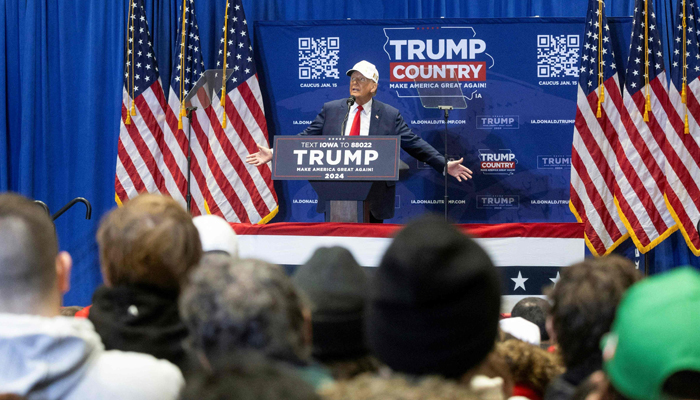 Former US president and Republican presidential hopeful Donald Trump speaks during a commit to caucus rally in Indianola, Iowa, on January 14, 2024. — AFP