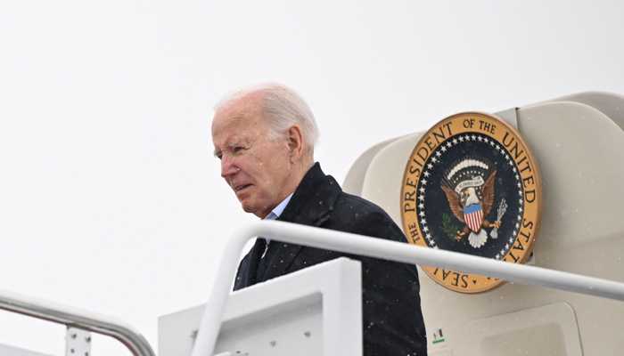 US President Joe Biden steps off Air Force One after returning from Philadelphia where he participated in a service event as the country marks Martin Luther King, Jr. Day on January 15, 2024, in Washington, DC. — AFP