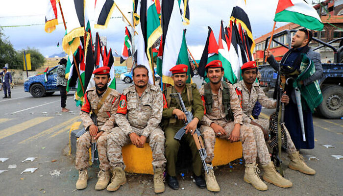 Members of Houthi-affiliated security forces pose for a photograph during prayers in solidarity with Gaza and the West Bank, in the Houthi-controlled Yemeni capital Sanaa on October 27, 2023. — AFP