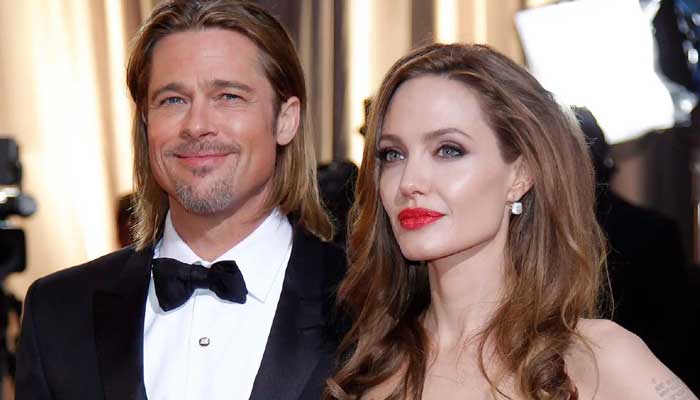 Brad Pitt seen with Angelina Jolie s family at an event amid