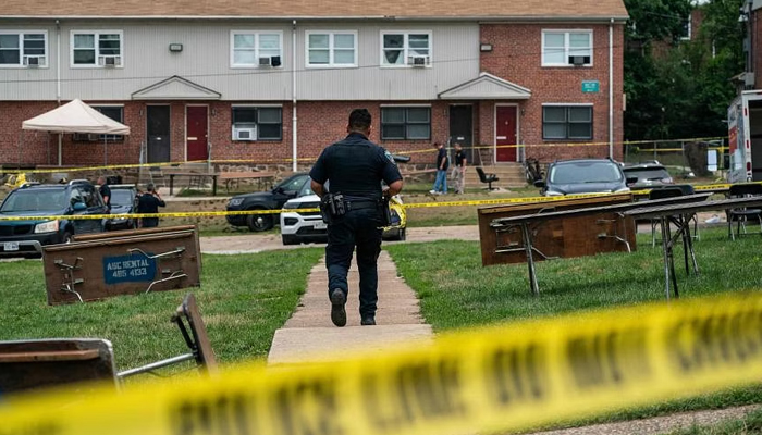 A representational image of a police officer walking at a crime scene. — AFP/File