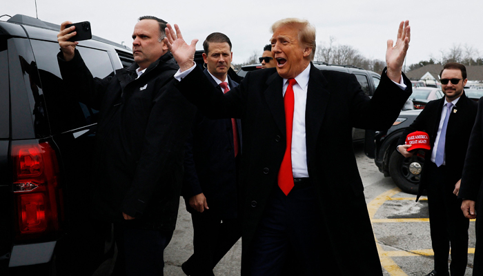 Republican presidential candidate, former US President Donald Trump visits a polling site at Londonderry High School on a primary day, on January 23, 2024 in Londonderry, New Hampshire. — AFP