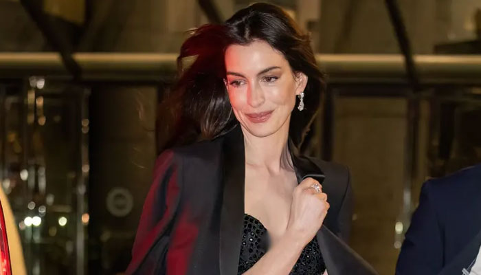 Anne Hathaway abruptly walks off planned photoshoot after a call