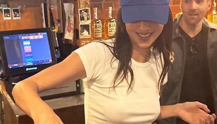 Kendall Jenner spreads cheer with shots and margaritas.