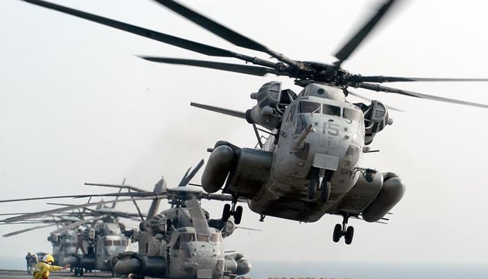 Bu görüntü, ABD Deniz Piyadeleri tarafından kullanılan bir CH-53E Super Stallion helikopterini göstermektedir.  - Deniz Hava Sistemleri Komutanlığı web sitesi