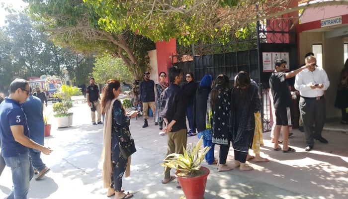 The picture shows voters standing outside polling station in Karachi on January 8, 2024. — Geo.tv