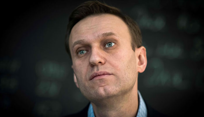 Alexei Navalny gestures during a gathering. — AFP/File