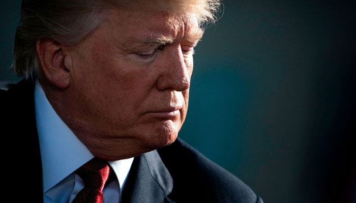 Donald Trump waits to speak at a 9/11 memorial service in 2017. — AFP File