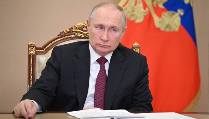 Russian President Vladimir Putin chairs a government meeting via videoconference from the Kremlin. — AFP/File