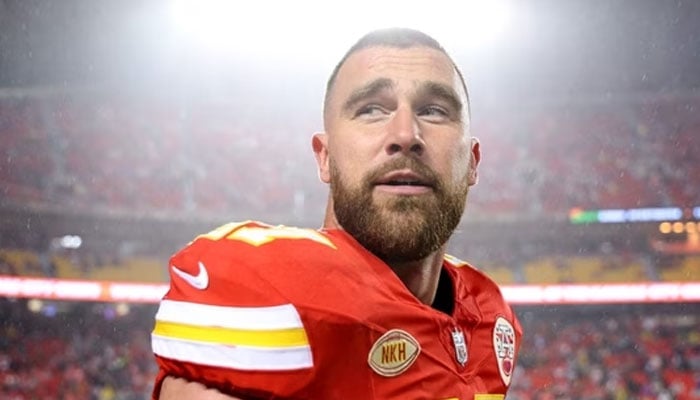 Travis Kelce #87 of the Kansas City Chiefs stands on the field before their game against the Philadelphia Eagles at GEHA Field at Arrowhead Stadium on November 20, 2023, in Kansas City, Missouri. — AFP