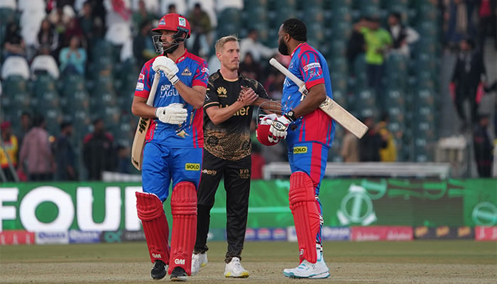 Karachi Kings James Vince (left) and Kieron Pollard (right) shaking hands with Peshawar Zalmis Luke Wood (centre) after the match played at Pakistan Super League (PSL) 9 on February 21, 2024. — PCB
