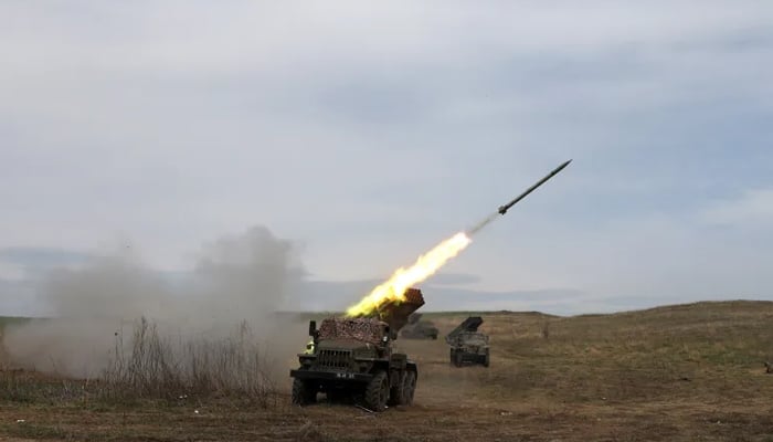 A Ukrainian multiple rocket launcher BM-21 “Grad” fires toward Russian troops’ position in the Donbas region — AFP/File