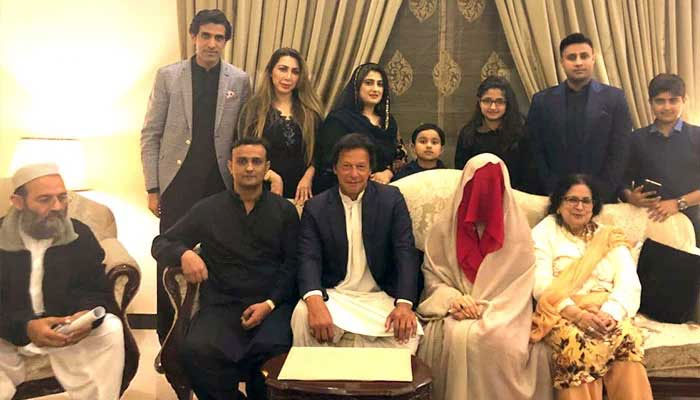 Imran Khan (centre) seated with Bushra Bibi following their nikah. — Twitter/@PTIOfficial