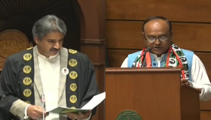 Sindh Assembly Speaker Awais Qadir Shah (left) administers oath to newly-elected Deputy Speaker Anthony Naveed in this still taken from a video on February 25, 2024. — Geo News