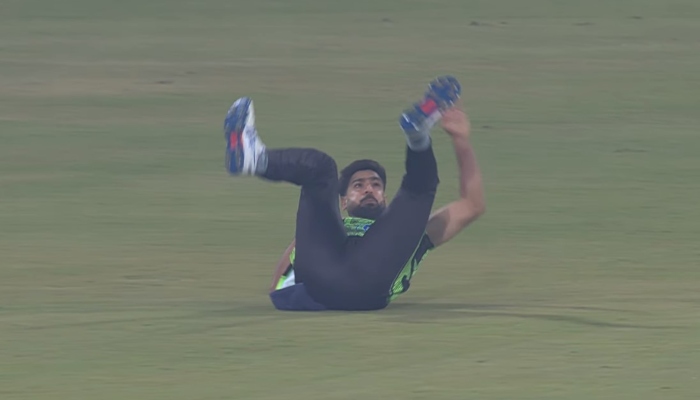 Haris Rauf, after diving in the air to take a catch, lands shoulder-first on the ground at the Gaddafi Stadium in Lahore on February 24, 2024. —PSL/YouTube