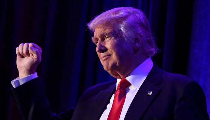 Donald Trump gestures during a political gathering. — AFP/File
