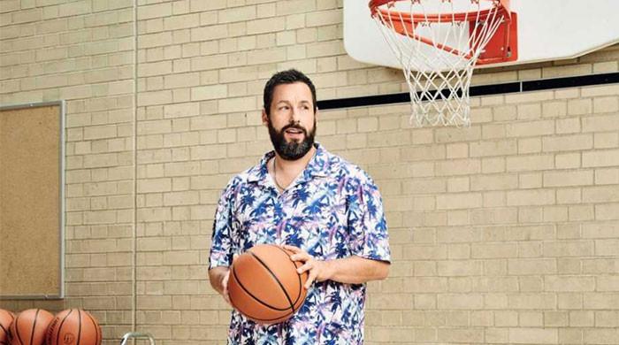 Adam Sandler plays basketball with shocked fans in a London rec center