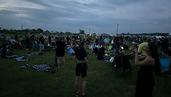 The sky darkened as totality passed over Fredericksburg, Texas. — CNN