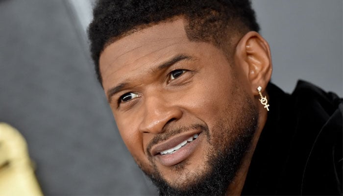 Usher shares 15-year-old son Naviyd with wife Jennifer Goicoechea