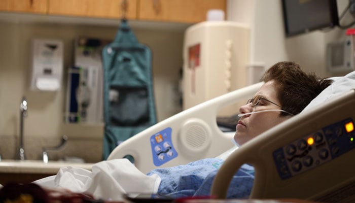 Representational image of a patient in a hospital bed. — Unsplash