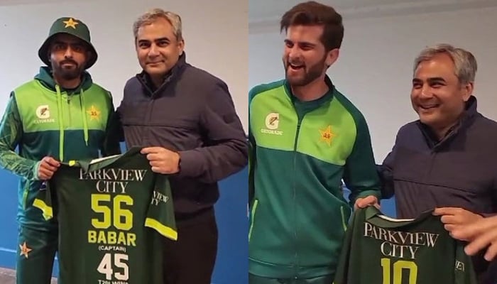 PCB Chairman Mohsin Naqvi hands over customised team jerseys to Babar Azam and Shaheen Afridi for most wins as skipper and 300 international wickets, respectively on May 13, 2024. — X/@TheRealPCB