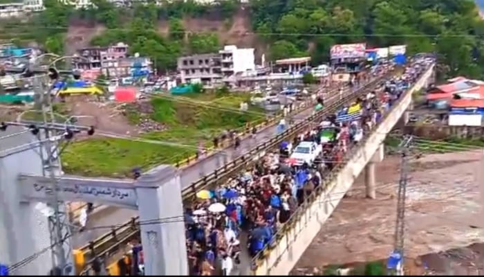 A large number of people are marching towards Muzaffarabad in Aza Jammu and Kashmir on April 13, 2024. — Screengrab/ X/ @upuknews1