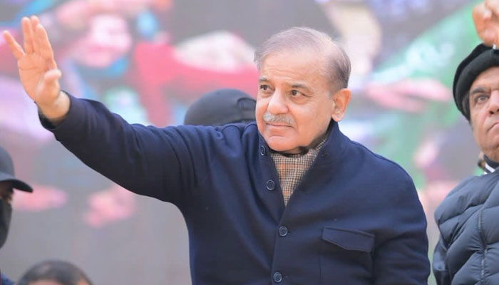 Prime Minister Shehbaz Sharif waves at the crowd during a PML-N gathering. — X/@CMShehbaz