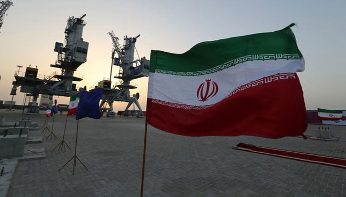 Iranian flags flutter during an inauguration ceremony for new equipment and infrastructure on February 25, 2019 at the Shahid Beheshti Port in the southeastern Iranian coastal city of Chabahar, on the Gulf of Oman. — AFP