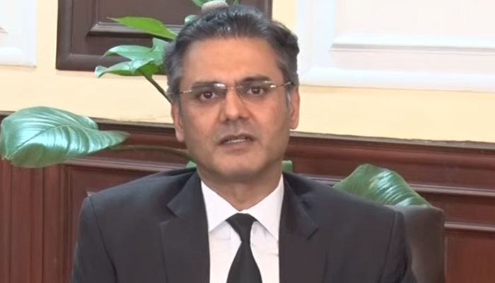 Attorney General for Pakistan (AGP) Mansoor Usman Awan is delivering a video message on May 14, 2024. — Screengrab/GeoNews