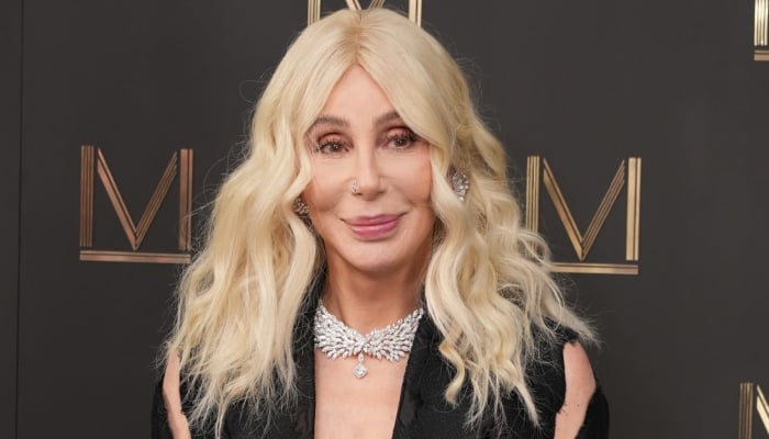 Cher goes back on her tall claims as she attends Hall of Fame